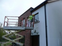 Safe painting using a mobile elevated platform. Full Public and Employers Insurance - Total Paintworks Ltd., Ireland